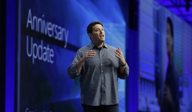 Terry Myerson, Microsoft Executive Vice President of the Windows and Devices Group, talks about an anniversary update to Windows 10 during the keynote address at the Microsoft Build Conference, Wednesday, March 30, 2016, in San Francisco. (AP Photo/Eric Risberg) CAER107  (Eric Risberg / The Associated Press)